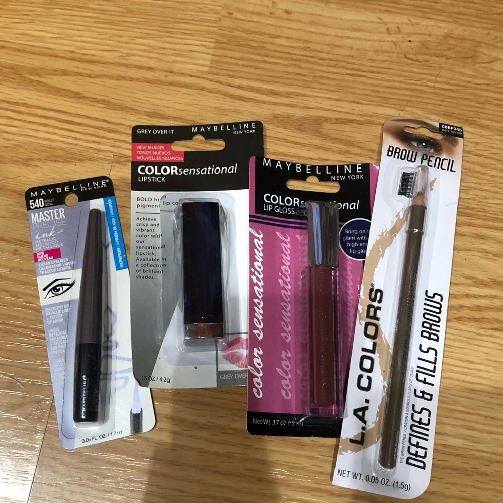 Maybelline lipgloss, Lipstick, violet eyeliner & LA COLORS brow pencil dk blonde
